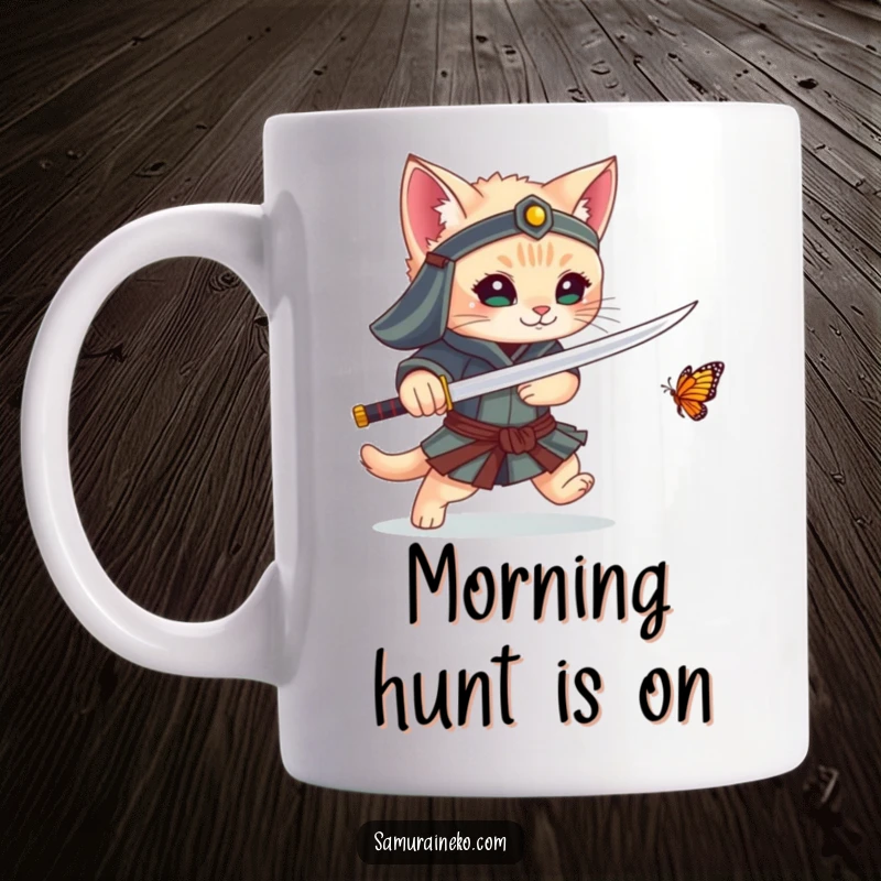 Funny mug showing a kitten samurai playfully chasing a tiny butterfly with its sword, a humorous and heartwarming scene.