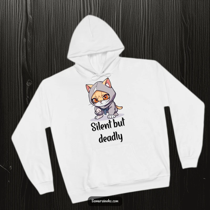 Funny cat ninja crouched low on a cozy hoodie, ready to pounce, a great funny gift.