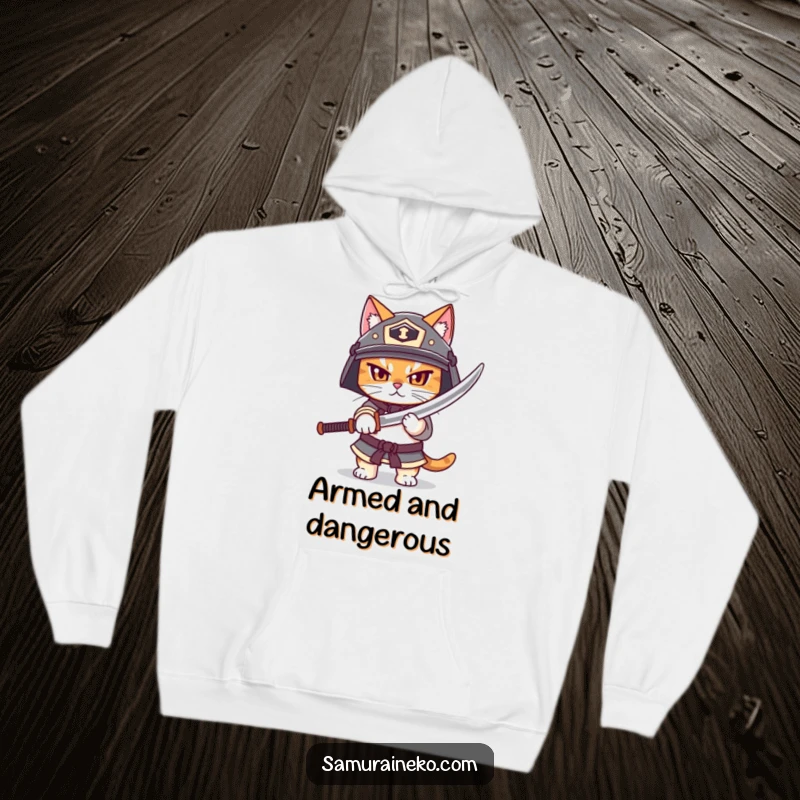 Funny hoodie with a brave cat in a helmet, unsheathing a miniature katana, perfect for fans of feline warriors and humor.