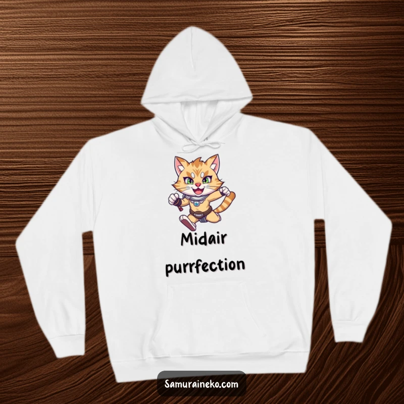Funny cat hoodie featuring a happy warrior cat in mid-leap with a determined expression, perfect for cozy and humorous wear.
