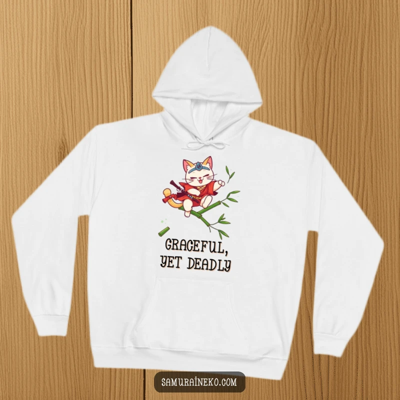 Funny cat samurai leaping over bamboo on a cozy hoodie, embodying grace, a great funny gift.