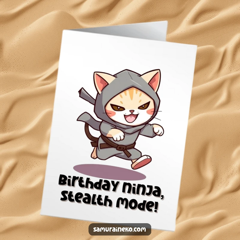 Funny Free Printable Birthday Card: A stealthy cat ninja leaping from a dark shadow with a wide, mischievous grin for a birthday.