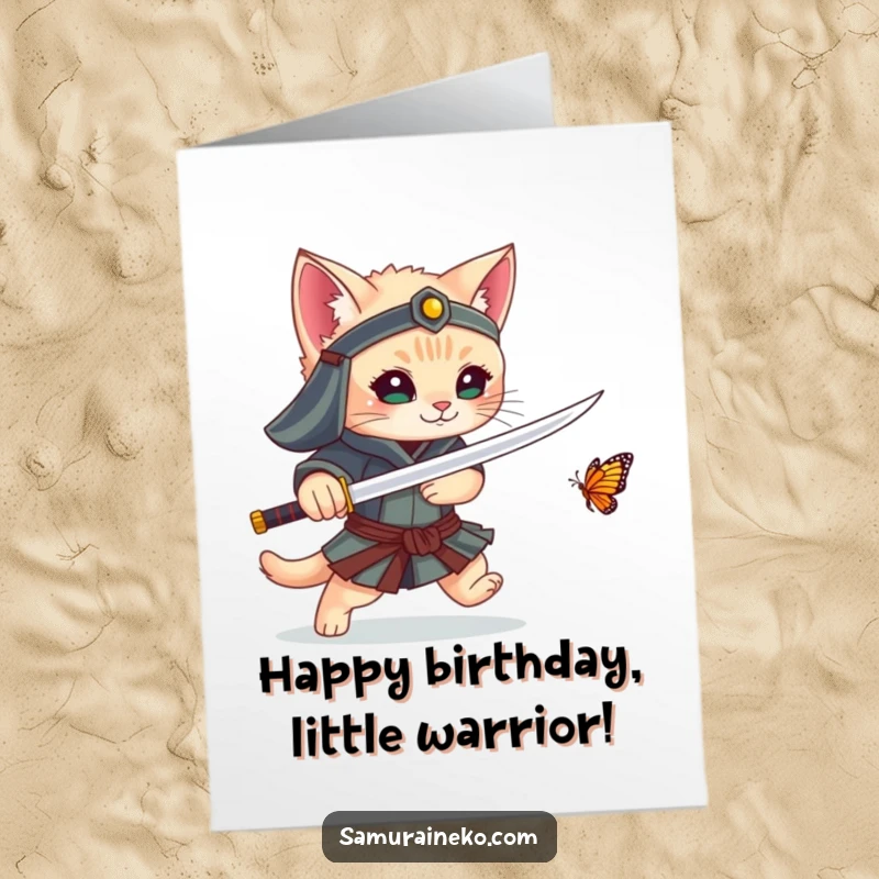 Funny Free Printable Birthday Card: A brave kitten samurai playfully chases a butterfly with its tiny sword.