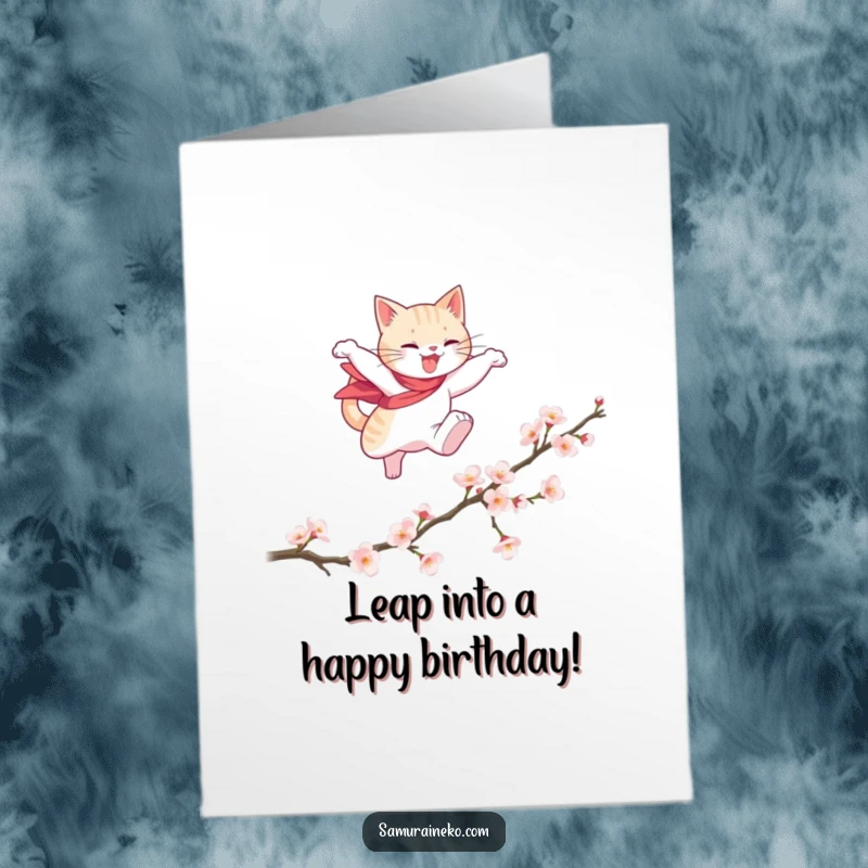 Funny Free Printable Birthday Card: A cat hero gracefully leaps over a delicate cherry blossom branch, embodying adventure and celebration.
