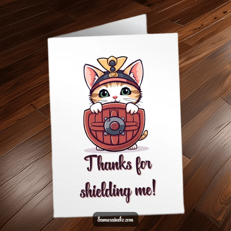 Funny Free Printable Thank You Card: Curious kitten peeking from behind a miniature samurai shield with a shy smile, showing thanks.