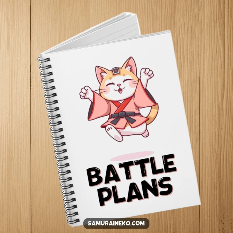 Funny cat in feudal Japanese warrior attire leaping triumphantly, inspiring heroic entries in this humorous notebook.