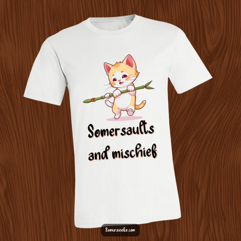 Funny Mischievous Kitten T-Shirt: A playful kitten performing a somersault with a miniature bamboo spear, full of mischievous energy. A funny gift.