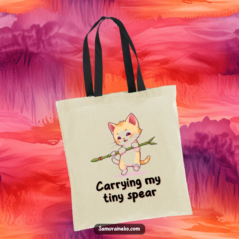 Funny Mischievous Kitten Tote Bag: Kitten performing a somersault with a tiny bamboo spear, ideal for carrying items with humor. A funny gift.